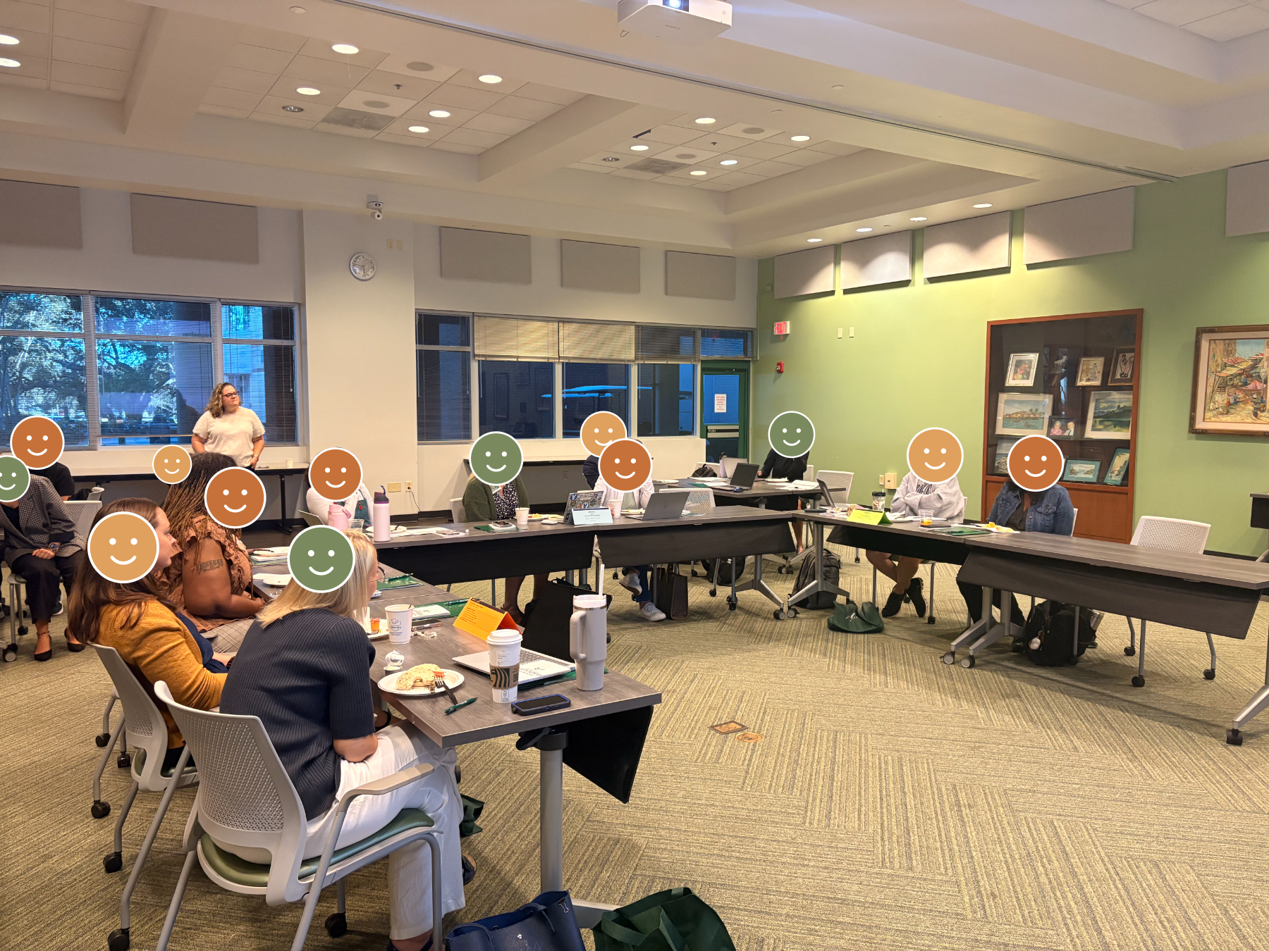 K–12 teachers seated around tables at the cohort kickoff